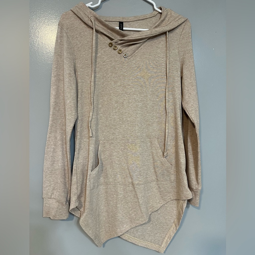 Cream hooded long sleeve with asymmetrical hem and front pocket
